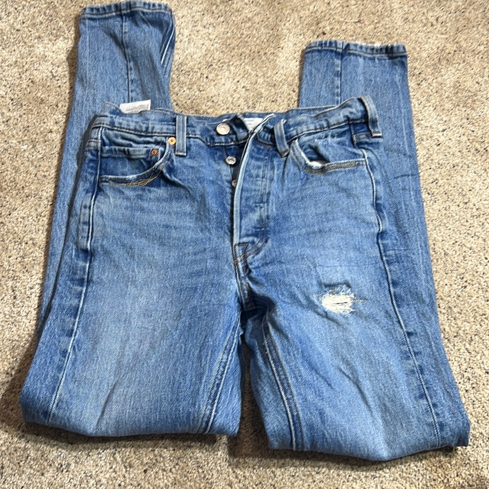 High-Rise Women's Blue Jeans with Distressed Detail